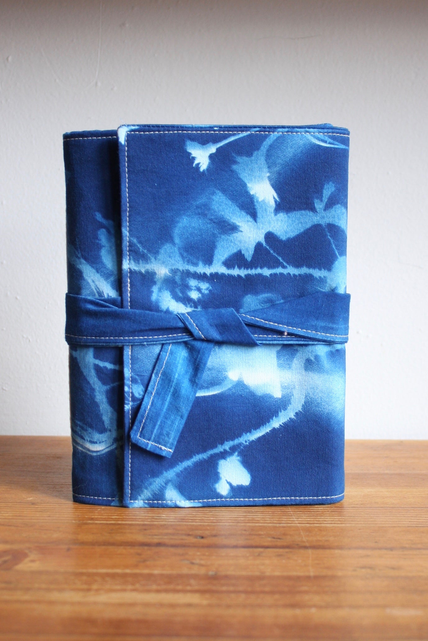 BOUND IN BLUE JOURNALS