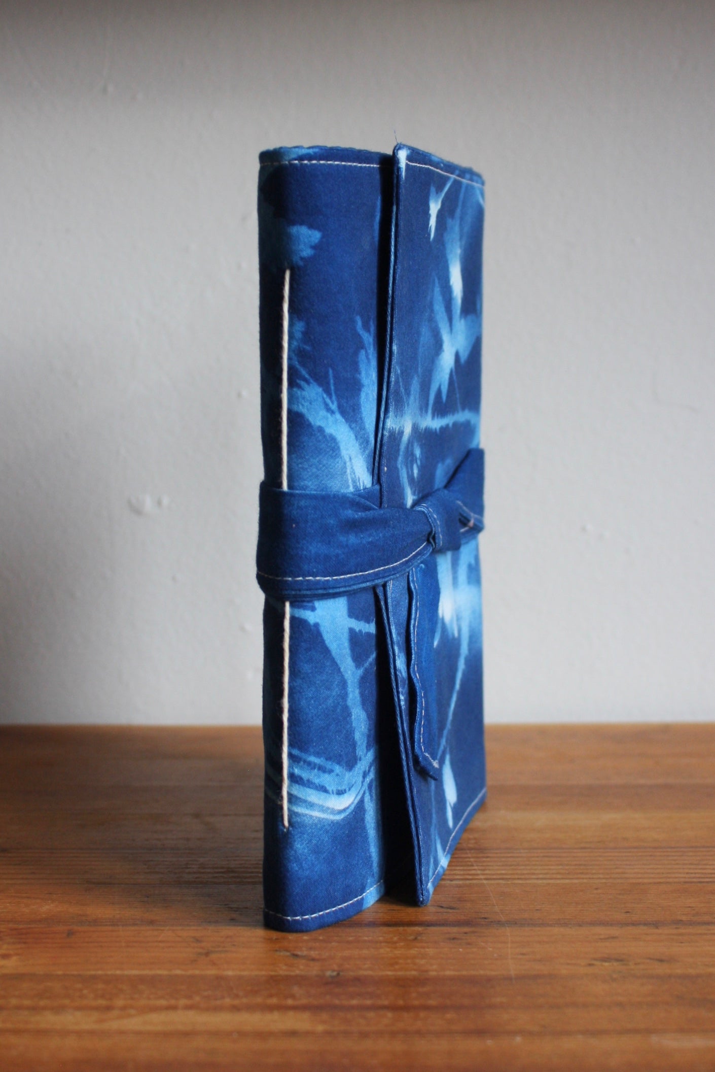 BOUND IN BLUE JOURNALS