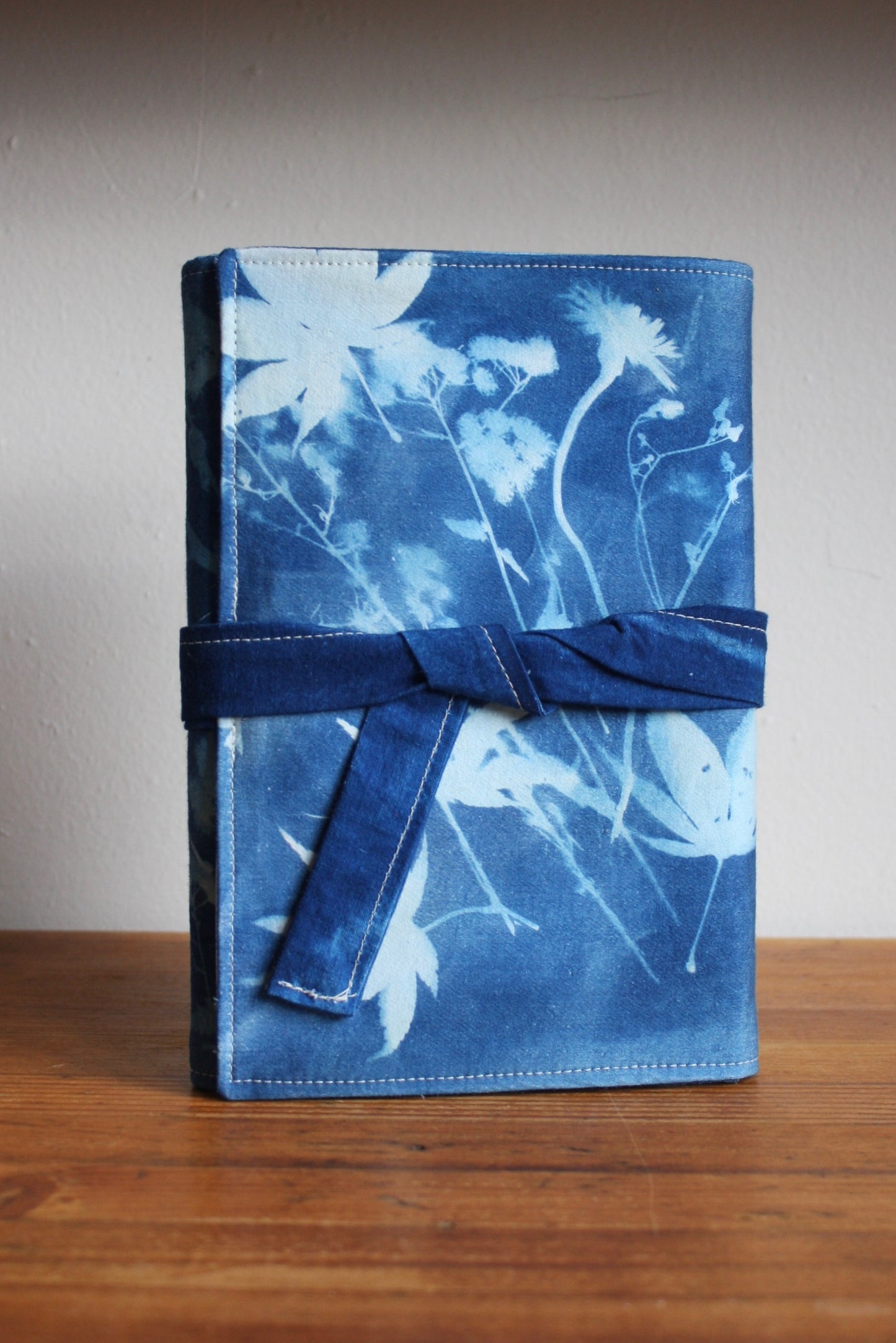 BOUND IN BLUE JOURNALS