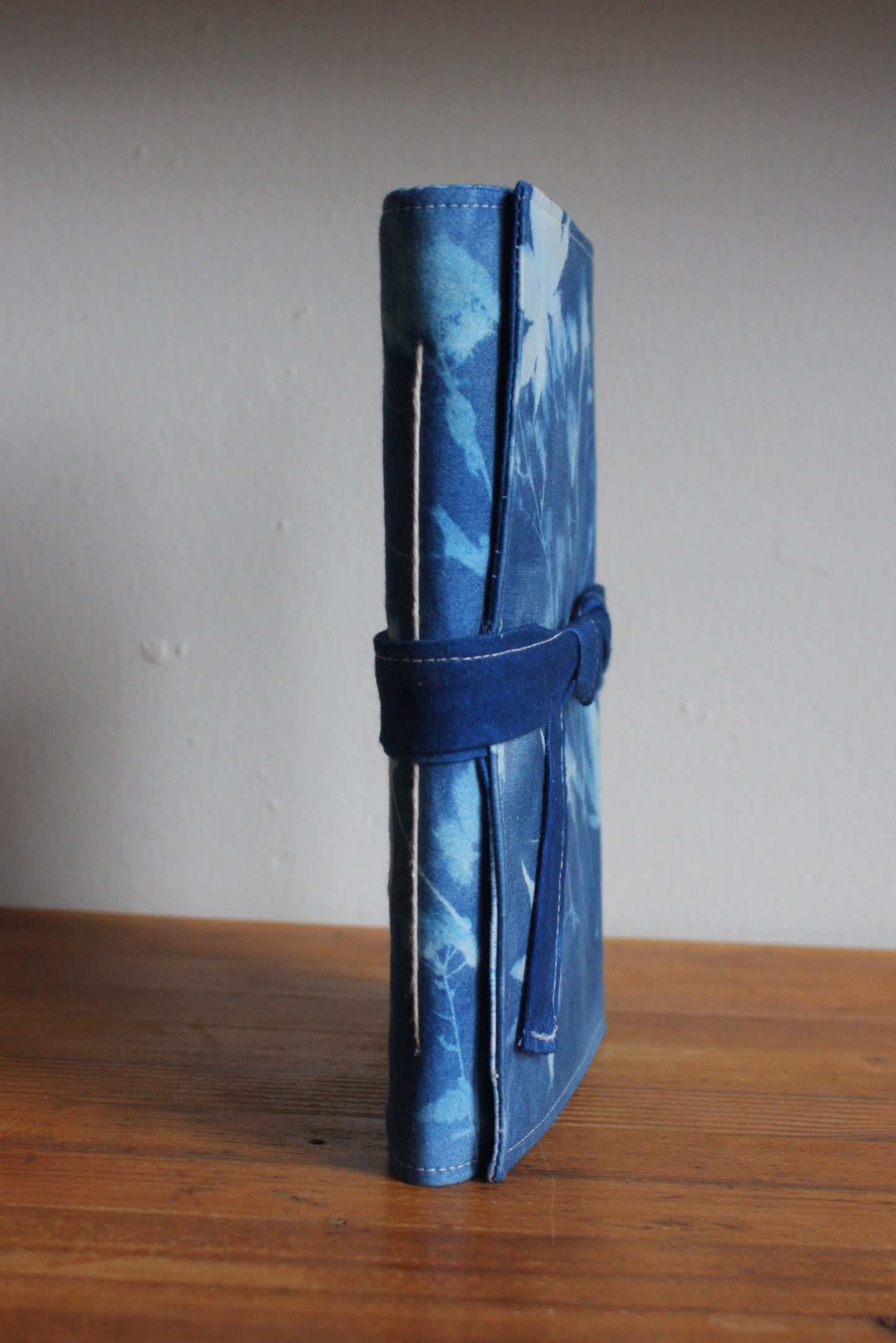 BOUND IN BLUE JOURNALS