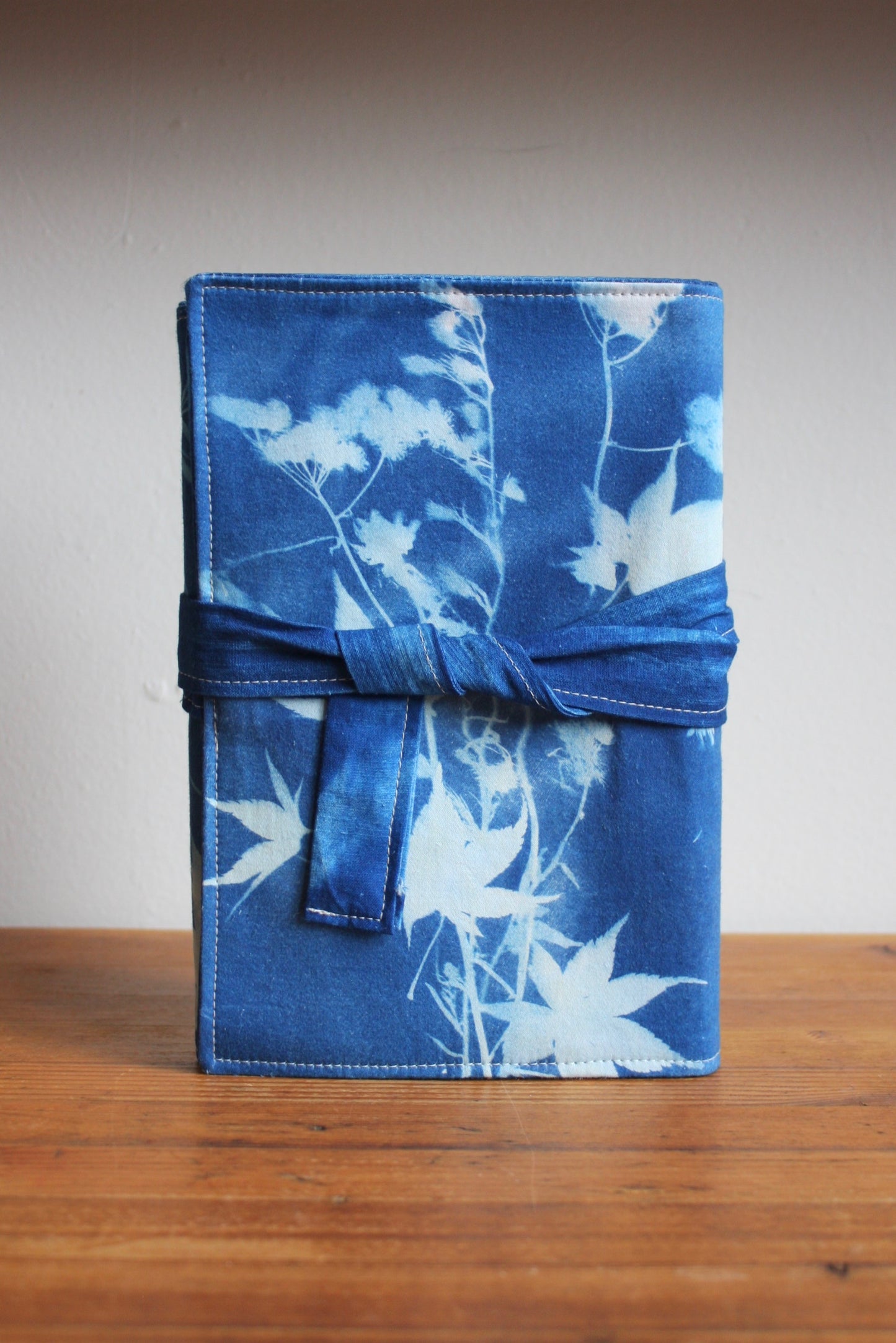 BOUND IN BLUE JOURNALS